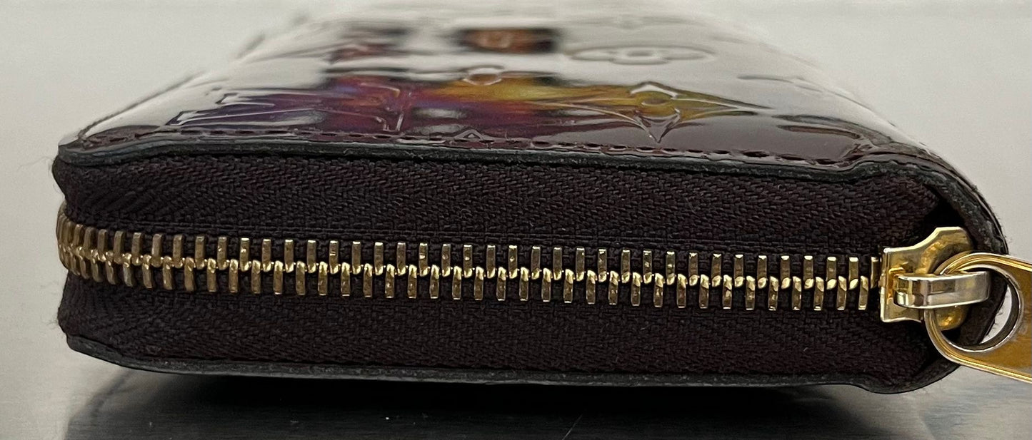 Louis Vuitton Zippy Lackleder