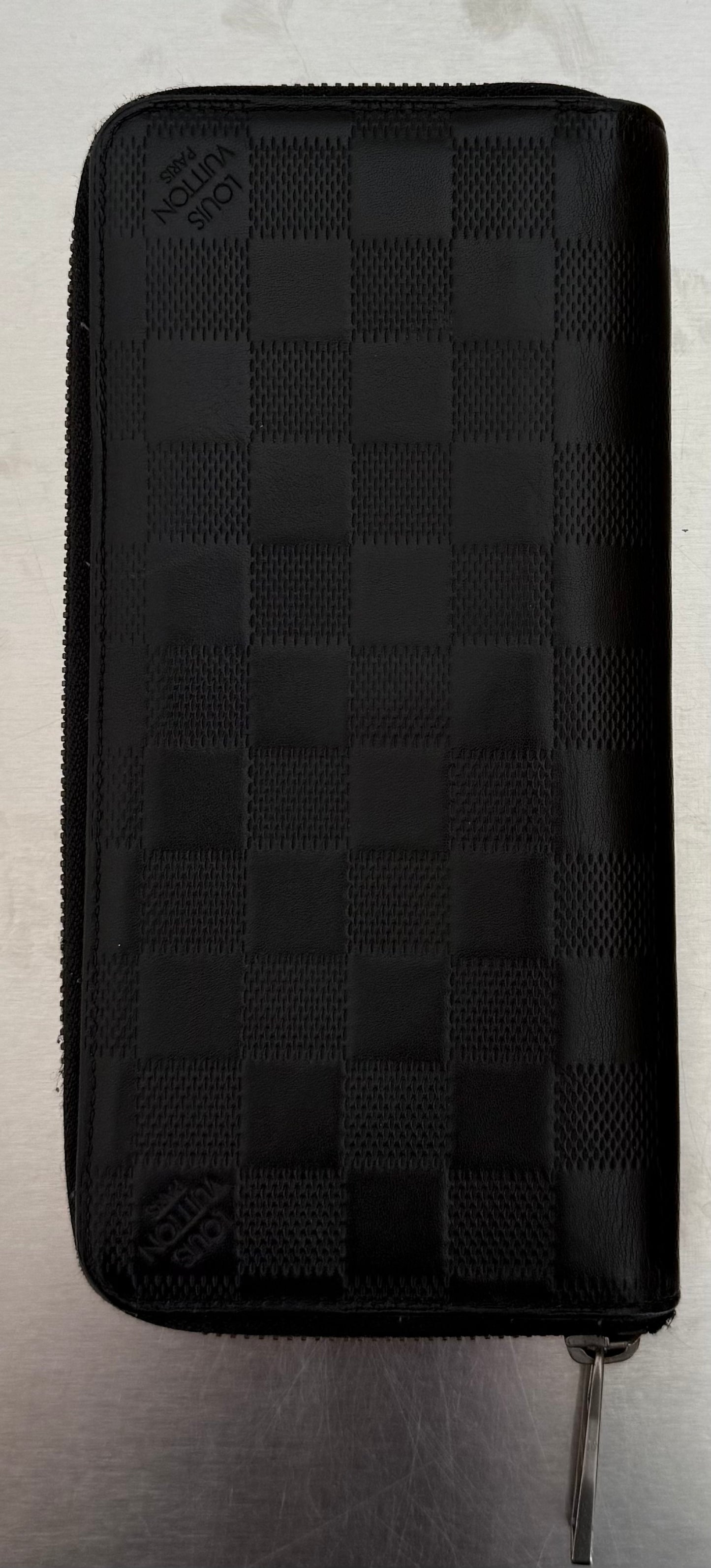 Louis Vuitton Zippy Vertical Infini Leder