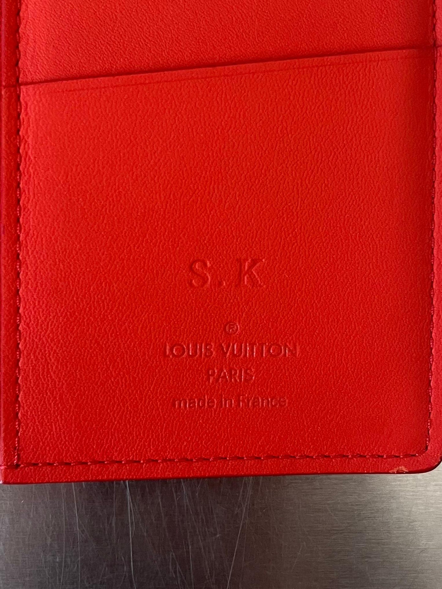 Louis Vuitton Brazza Infini Leder