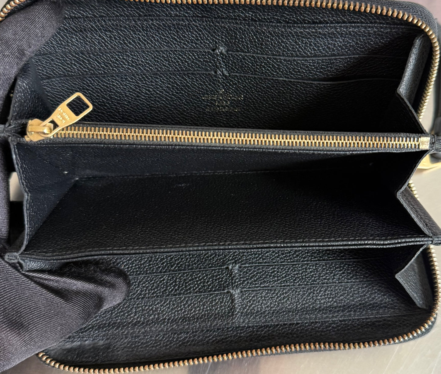 Louis Vuitton Zippy Monogram Empreinte Leder