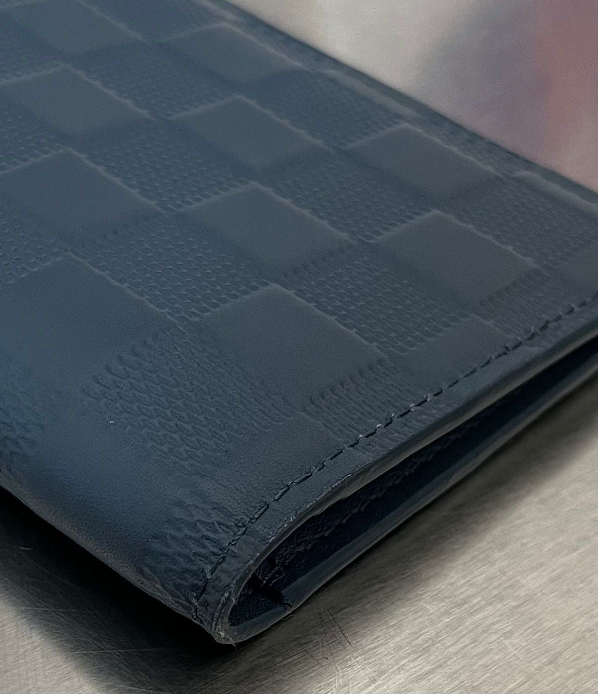 Louis Vuitton Brazza Infini Leder