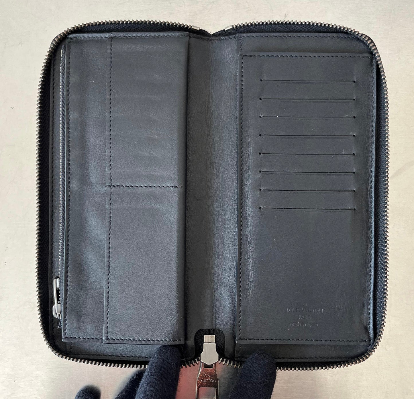 Louis Vuitton Zippy Vertical Infini Leder