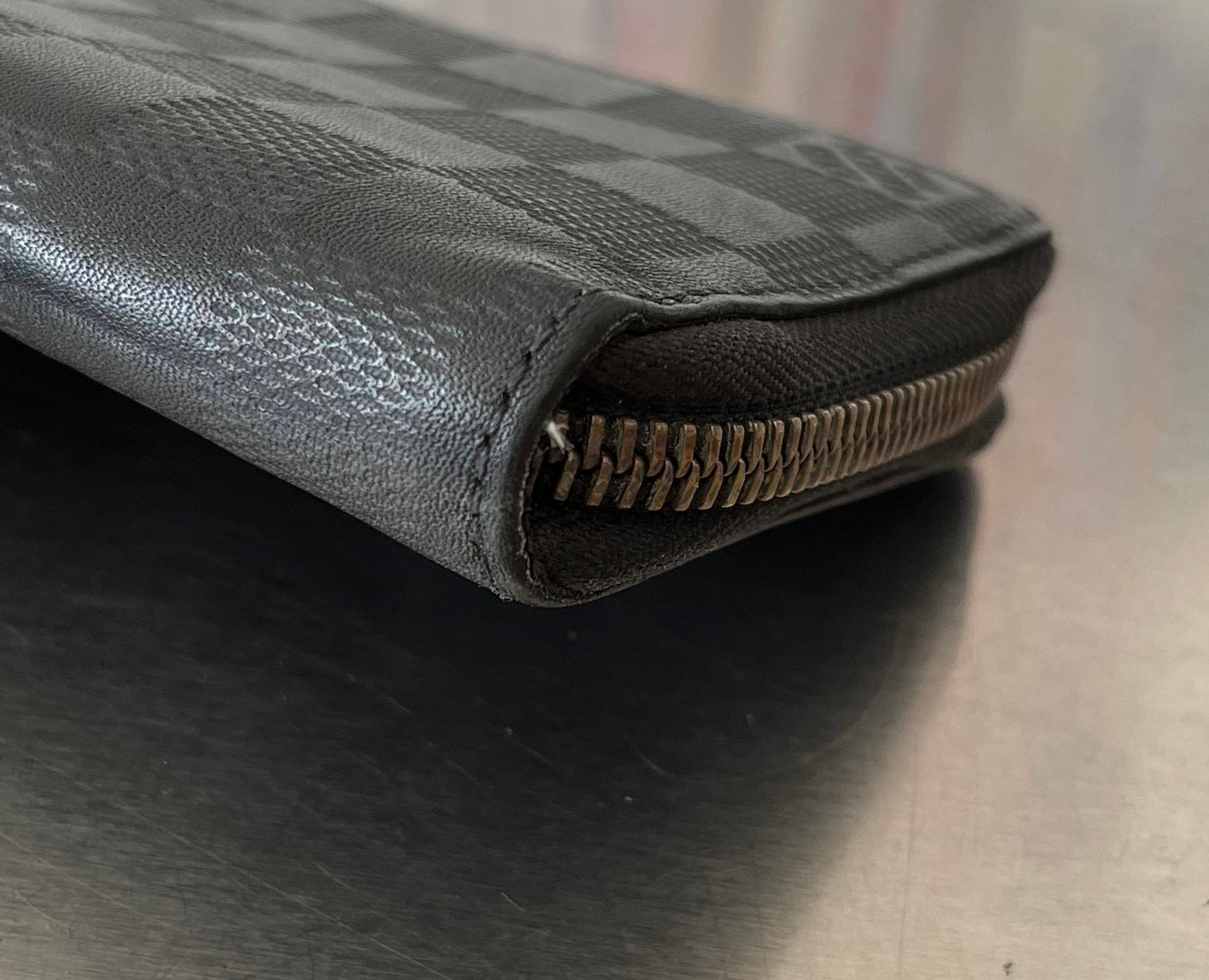 Louis Vuitton Zippy Vertical Infini Leder