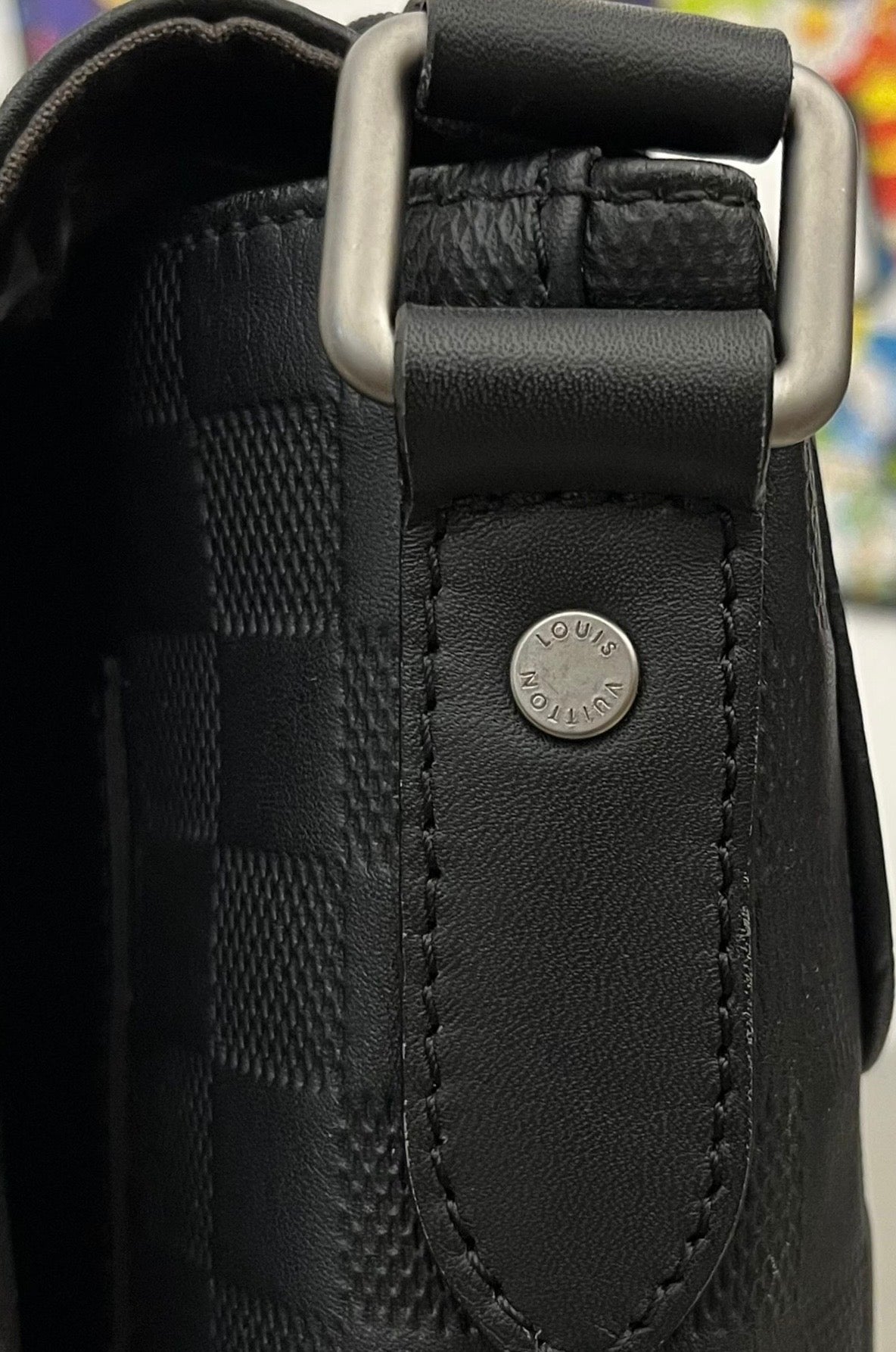Louis Vuitton District Infini Leder