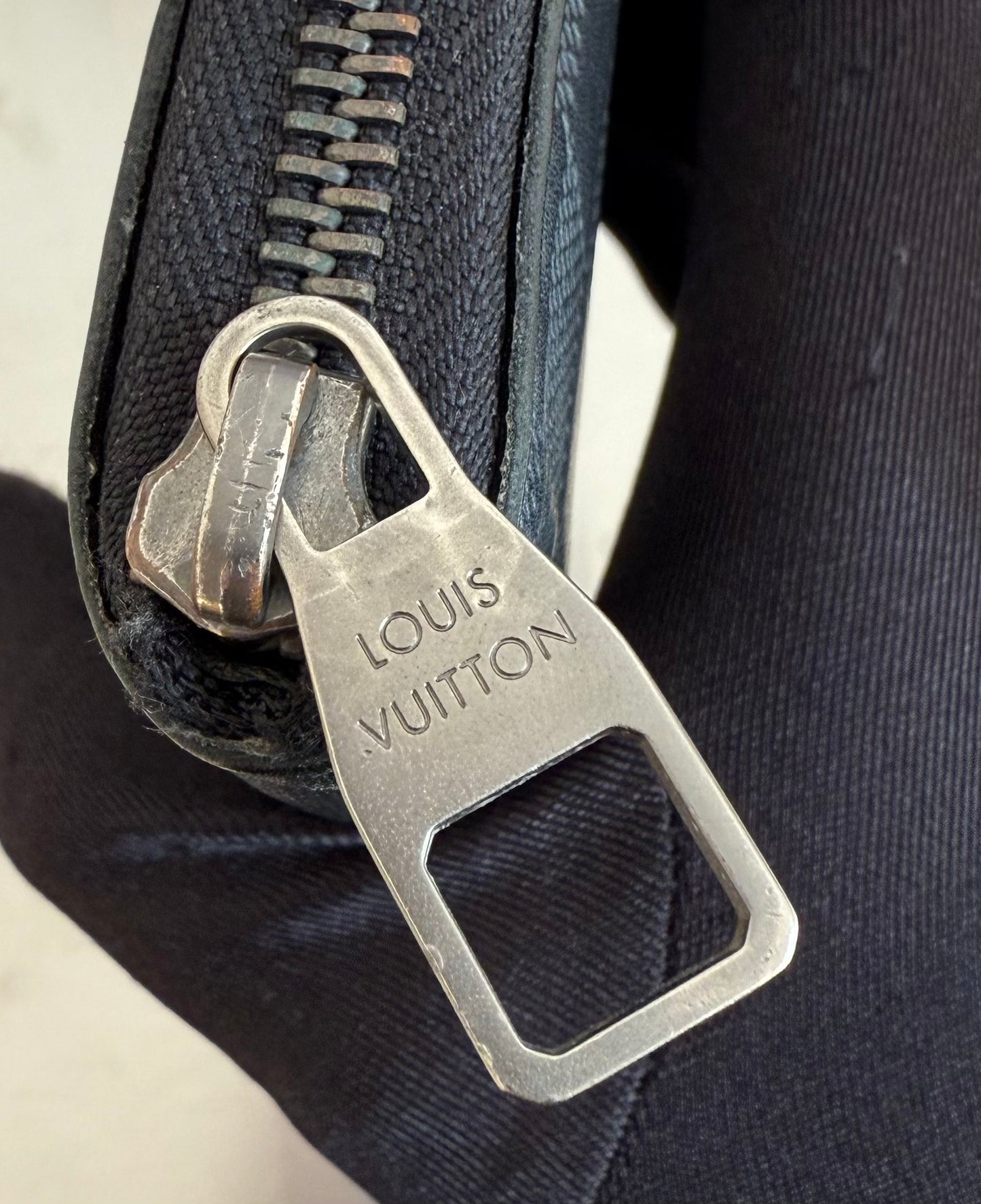Louis Vuitton Zippy Vertical Infini Leder