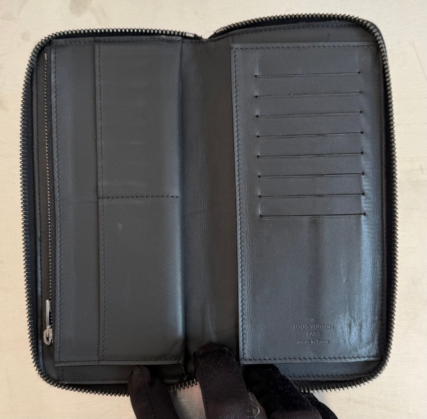 Louis Vuitton Zippy Vertical Infini Leder