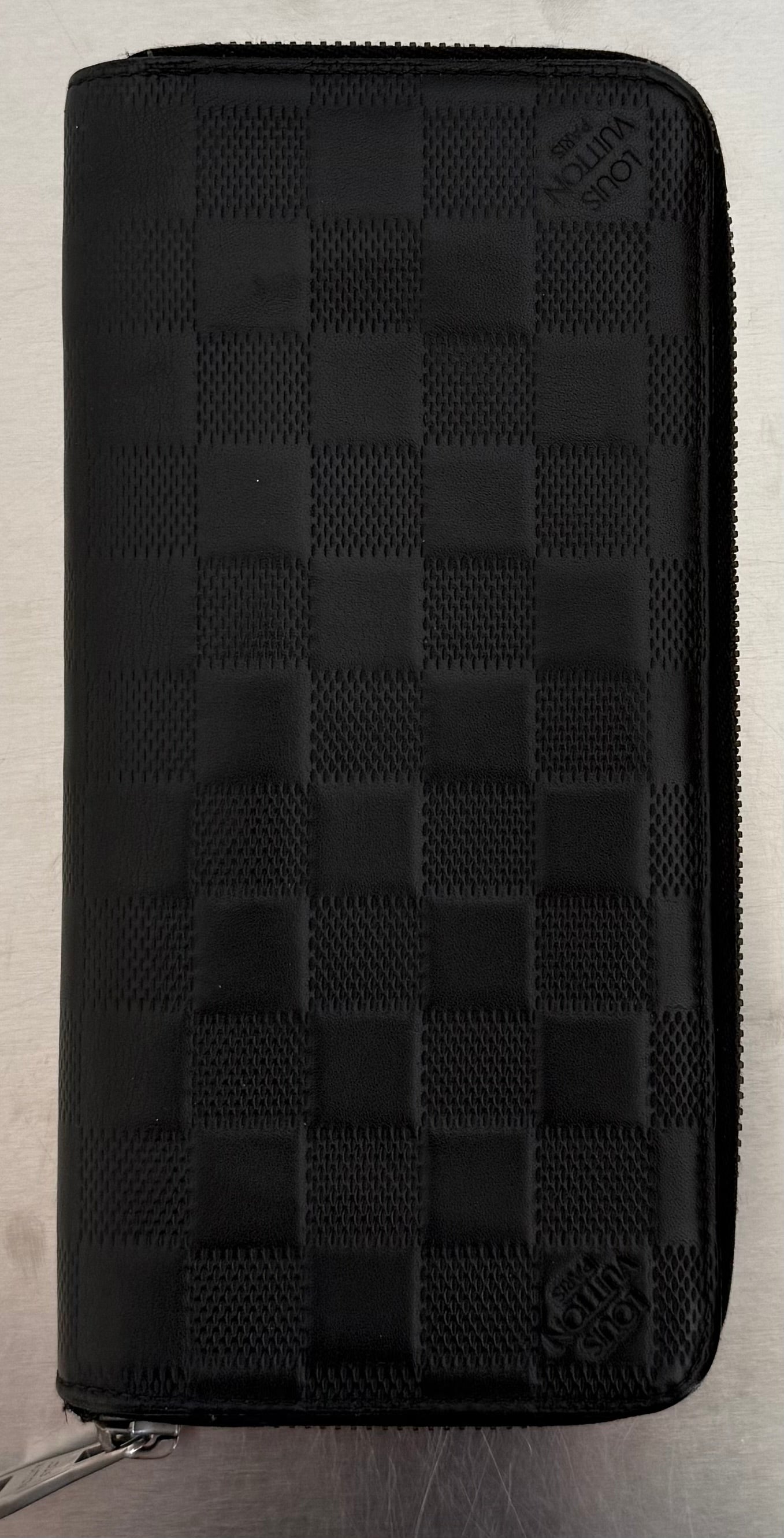 Louis Vuitton Zippy Vertical Infini Leder