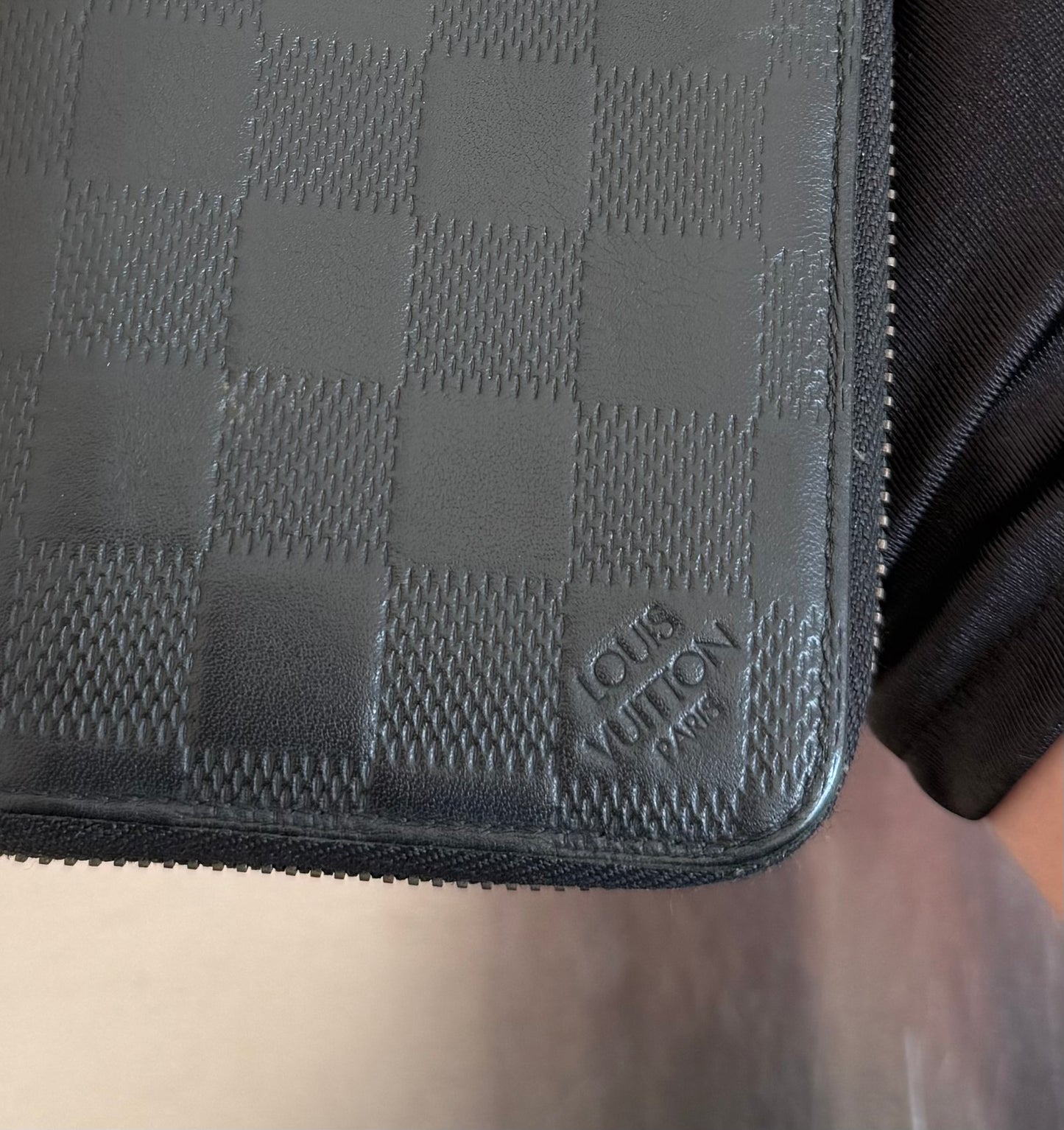 Louis Vuitton Zippy Vertical Infini Leder