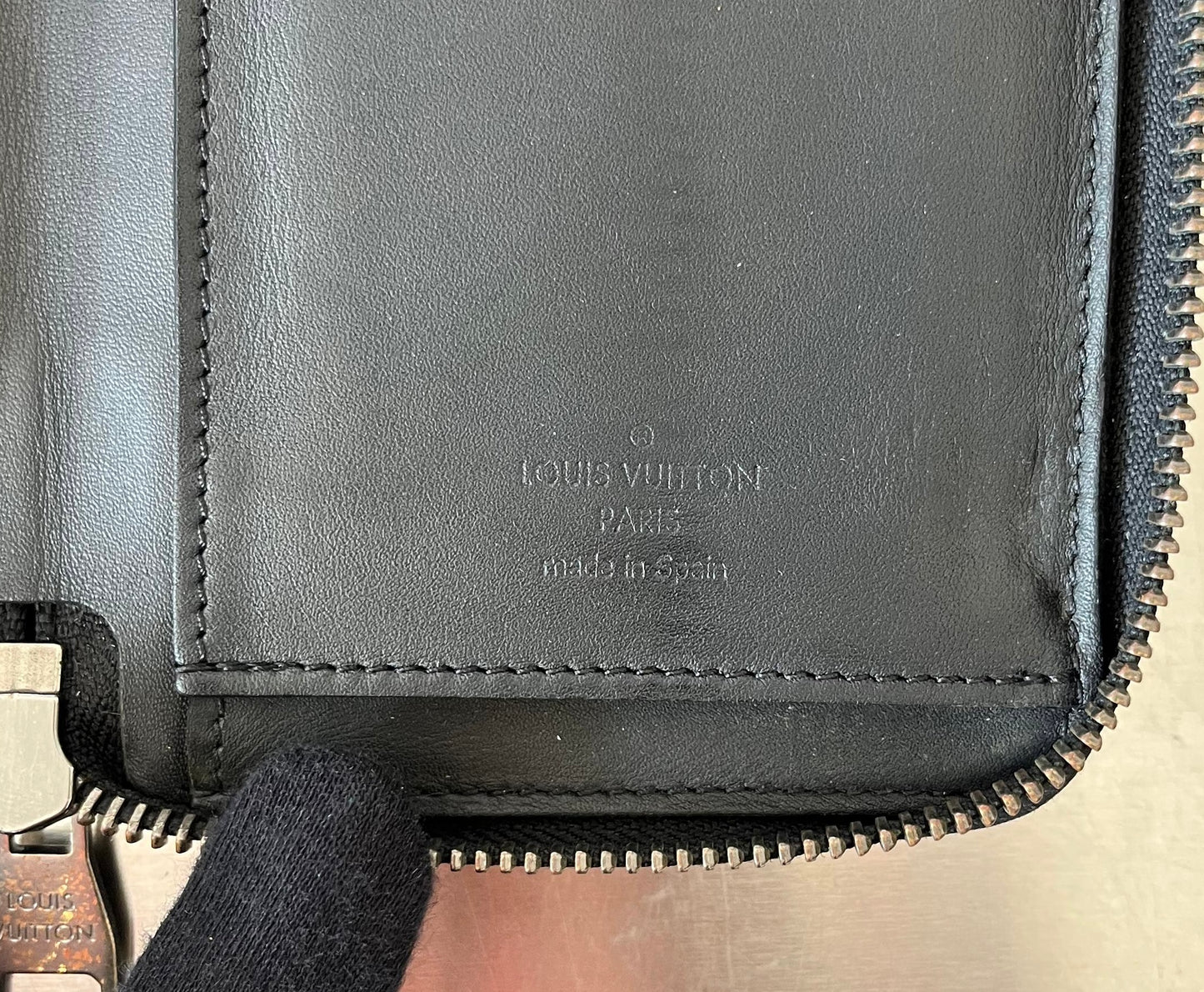 Louis Vuitton Zippy Vertical Infini Leder