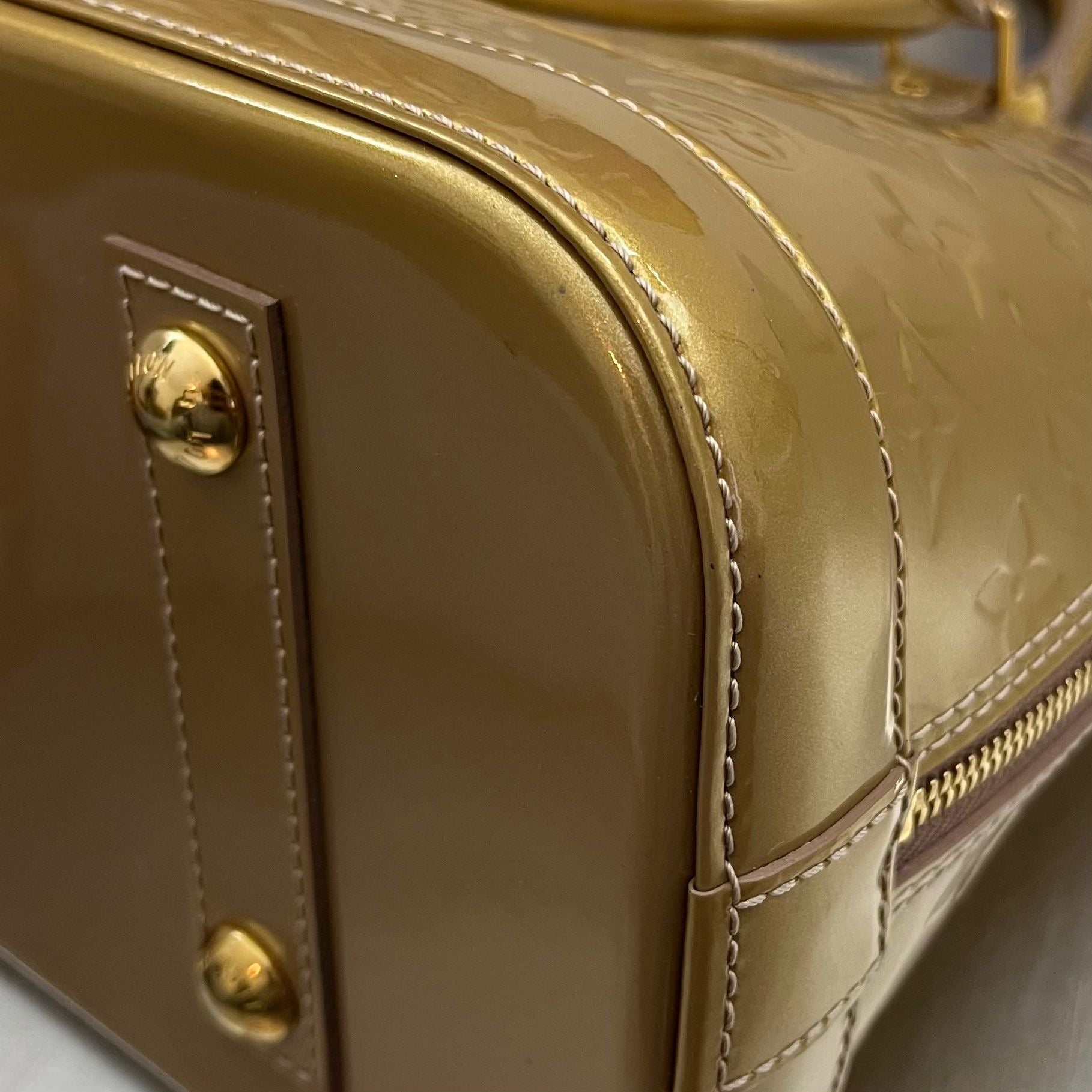 Louis Vuitton Alma PM Vernis Gold