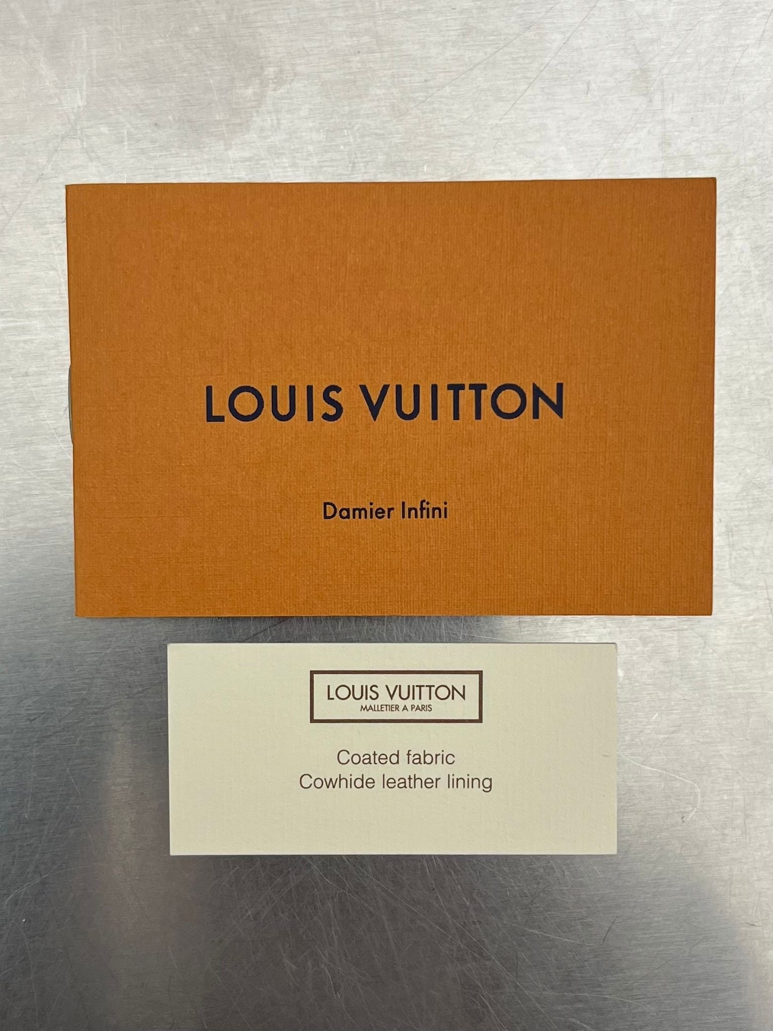 Louis Vuitton Discovery Pochette Infini Leder