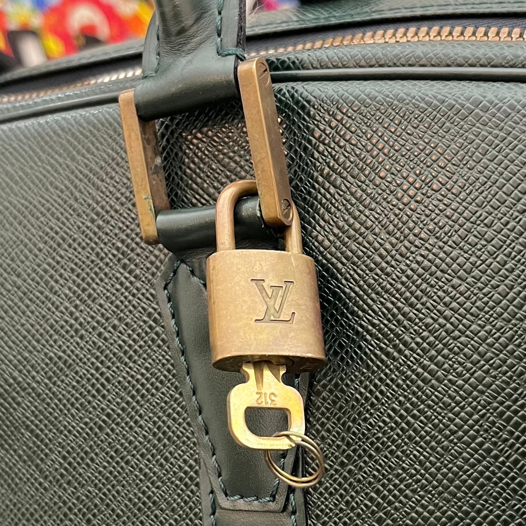 Louis Vuitton Helanga Taiga