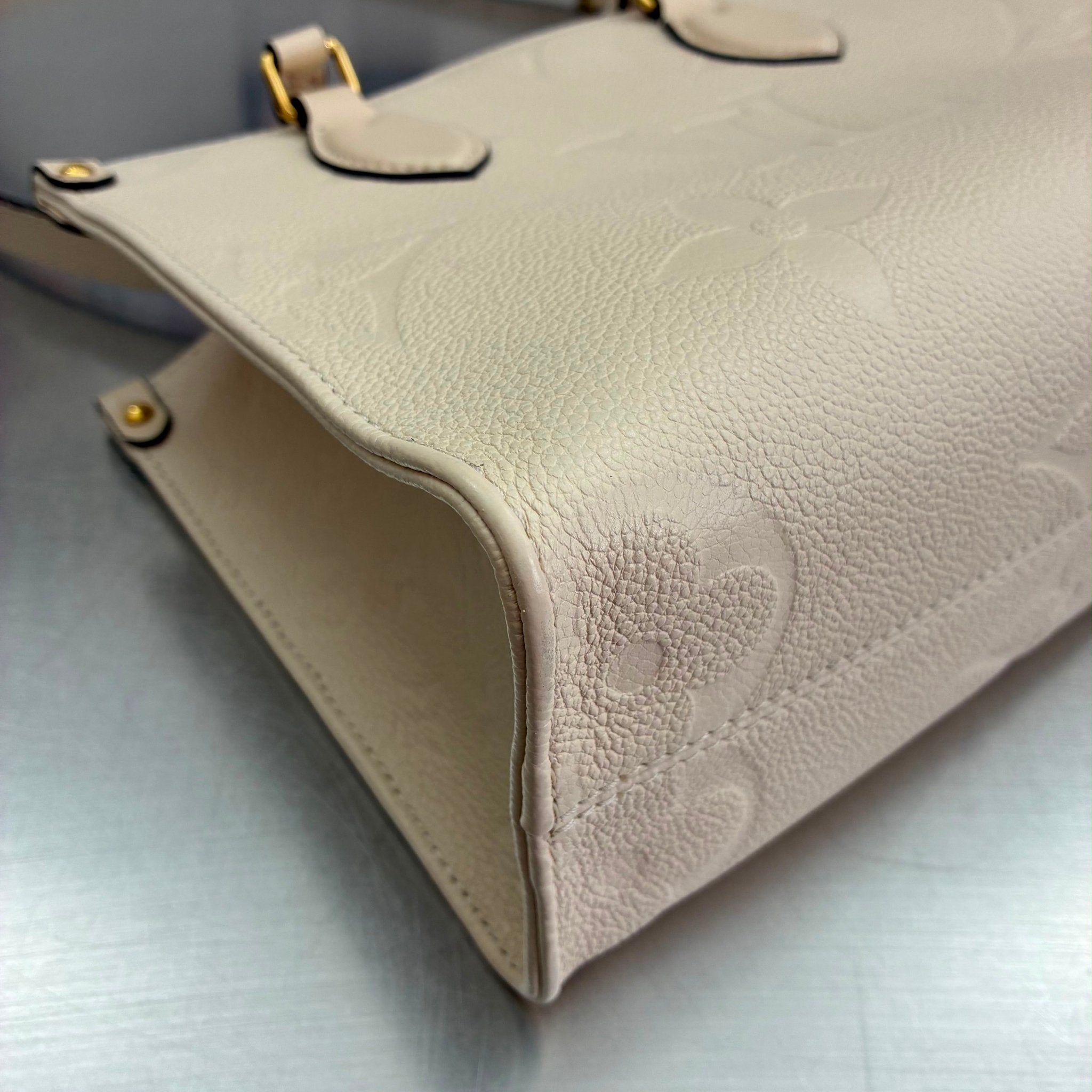Louis Vuitton OnTheGo PM Empreinte M46569