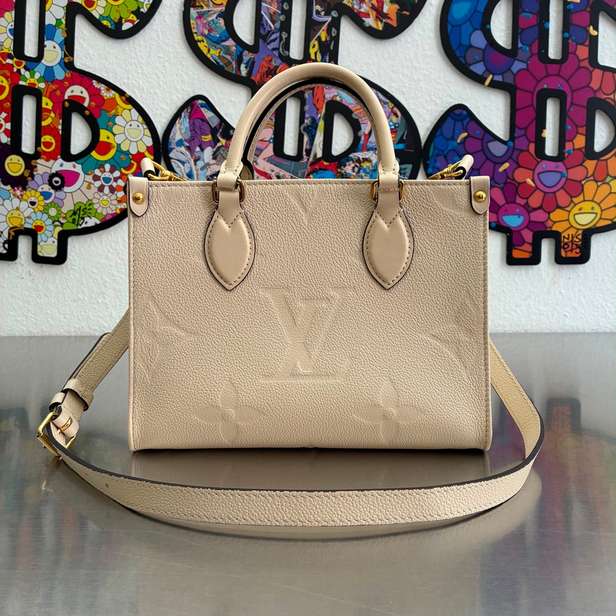 Louis Vuitton OnTheGo PM Empreinte M46569