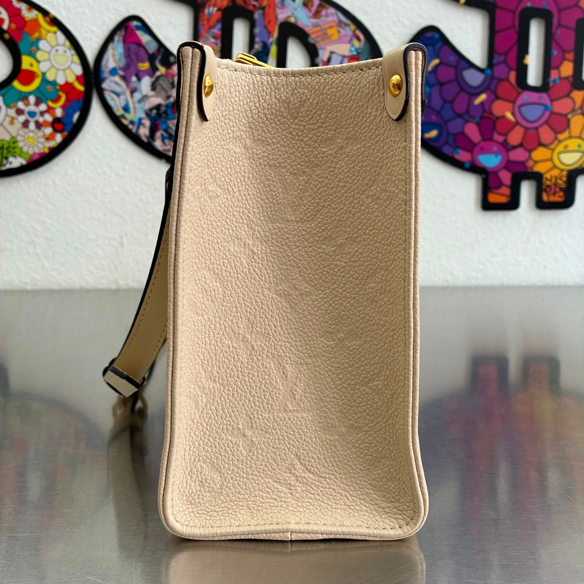 Louis Vuitton OnTheGo PM Empreinte M46569