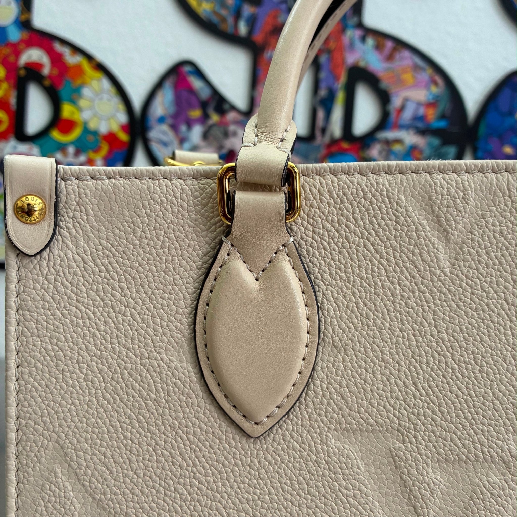 Louis Vuitton OnTheGo PM Empreinte M46569
