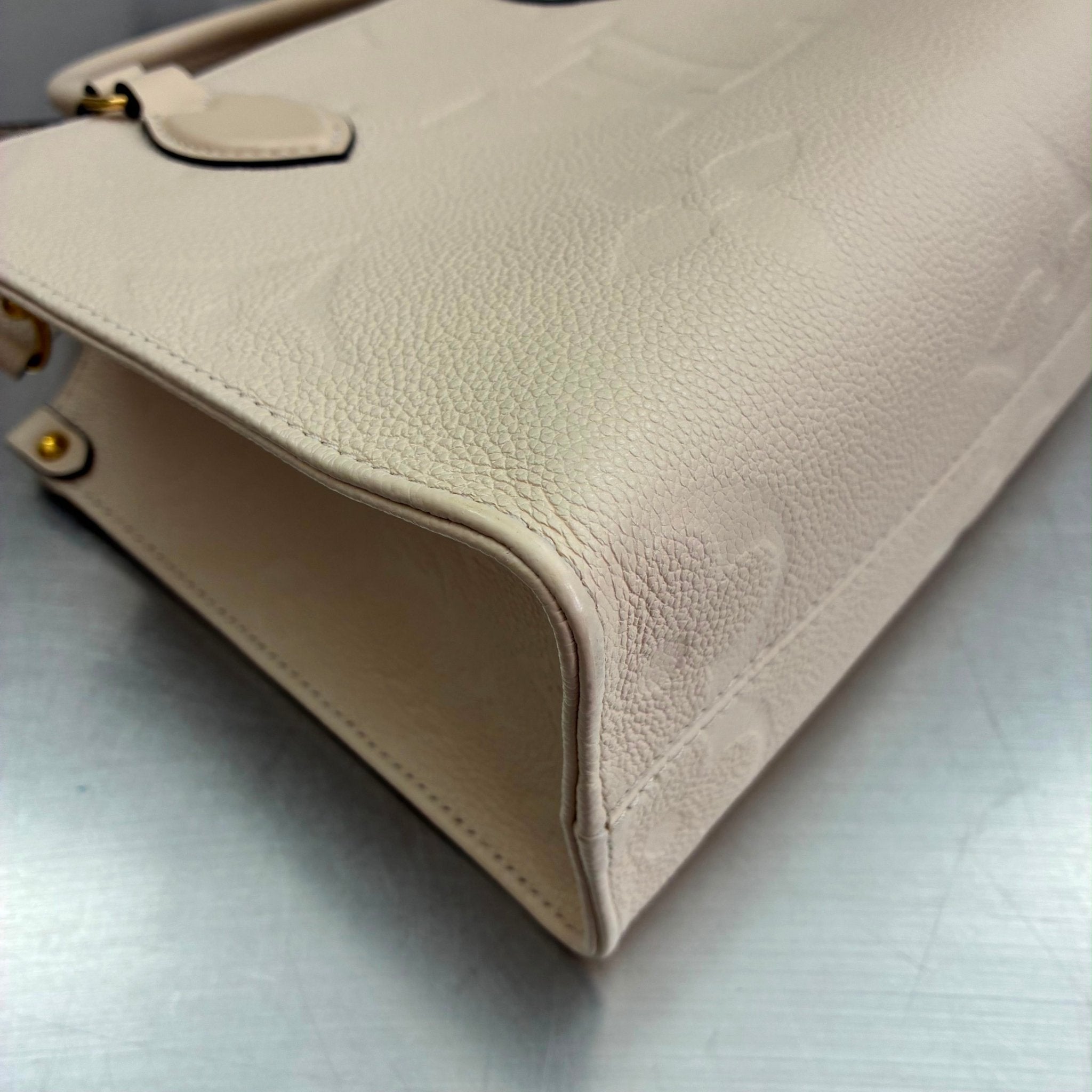Louis Vuitton OnTheGo PM Empreinte M46569