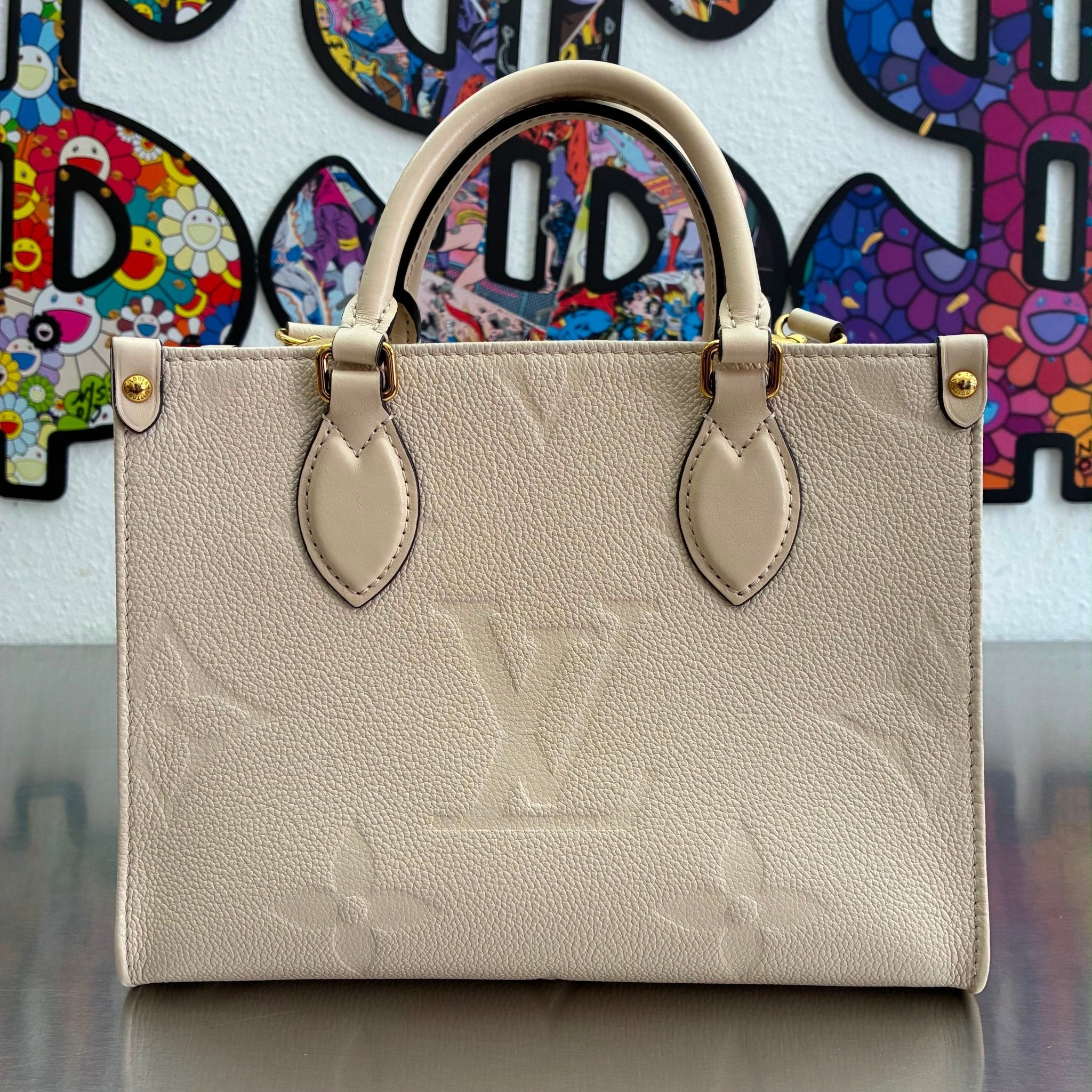 Louis Vuitton OnTheGo PM Empreinte M46569