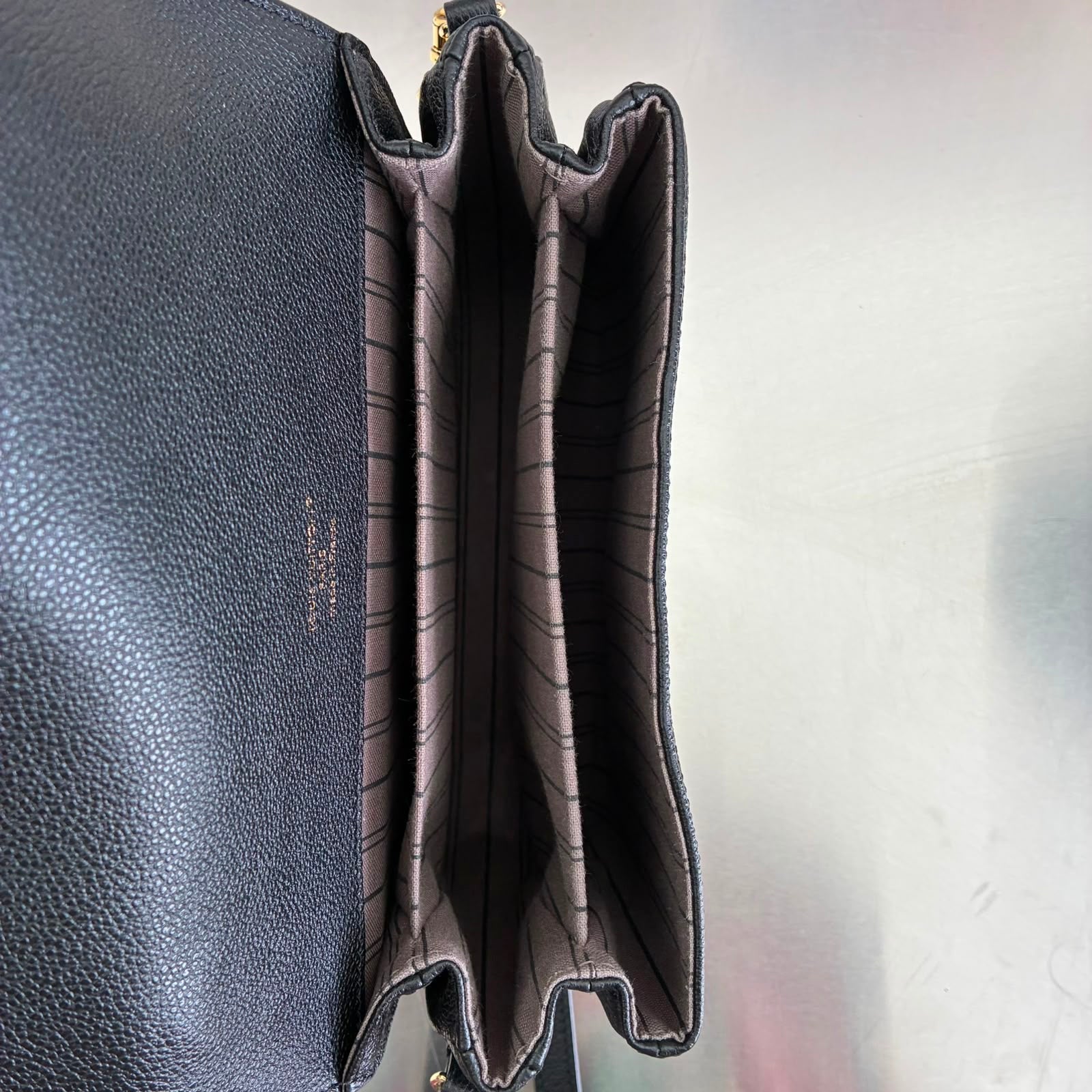 Louis Vuitton Pochette Métis Empreinte M41487