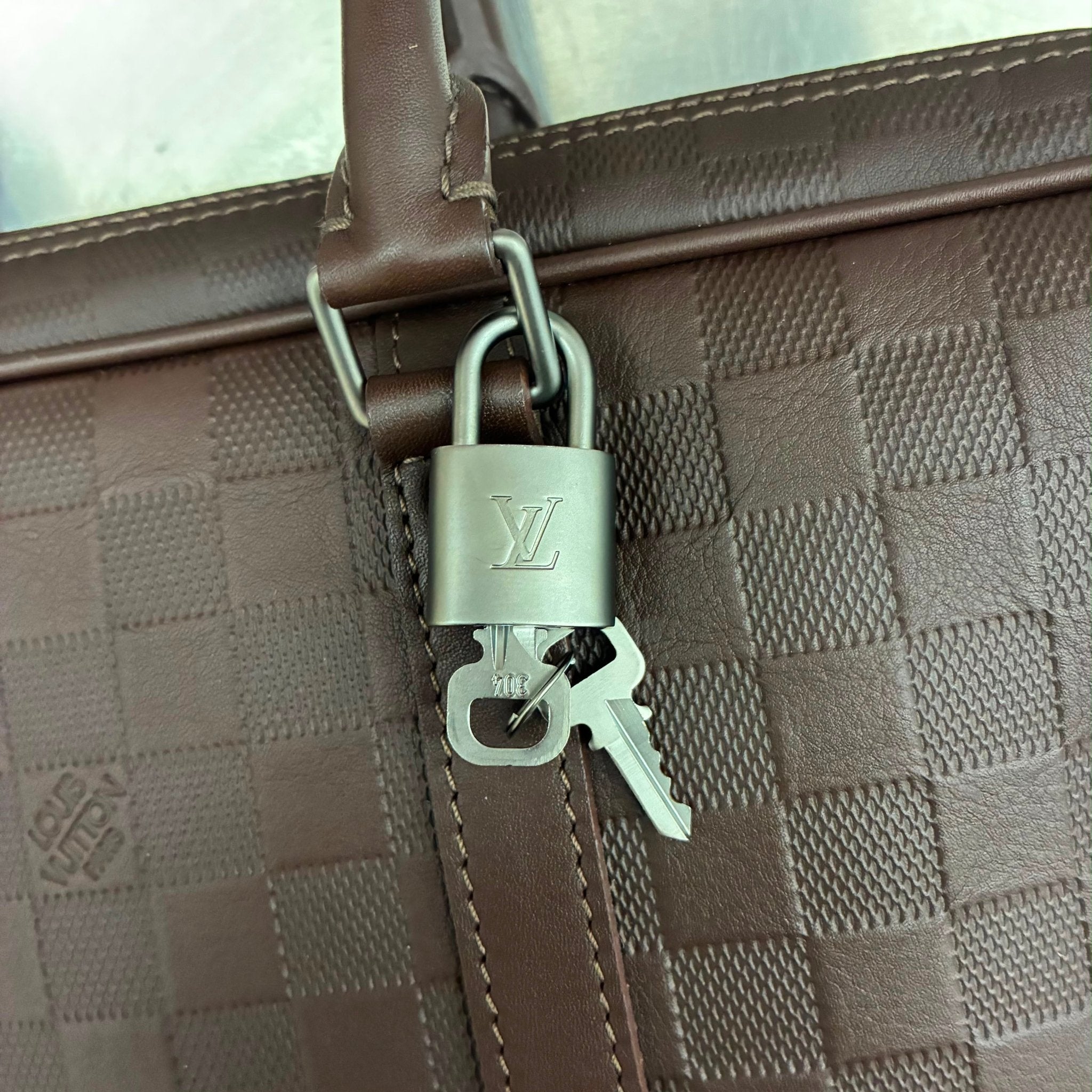Louis Vuitton Porte Documents Voyage Damier Infini