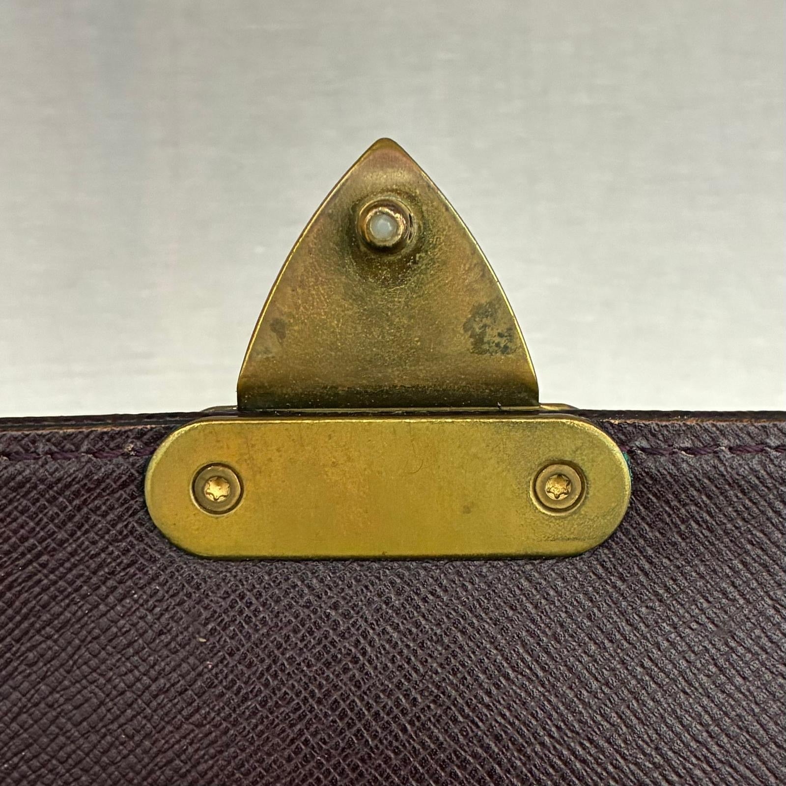 Louis Vuitton Serviette Kourad Taiga