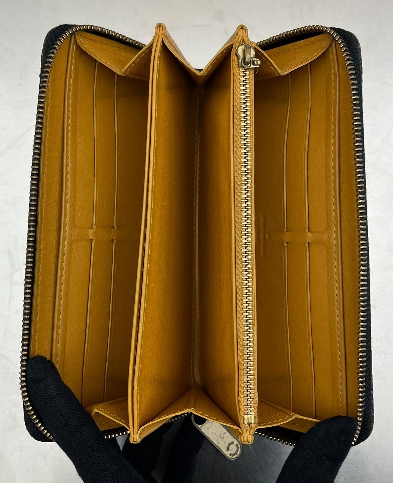 Louis Vuitton Zippy Black Denim