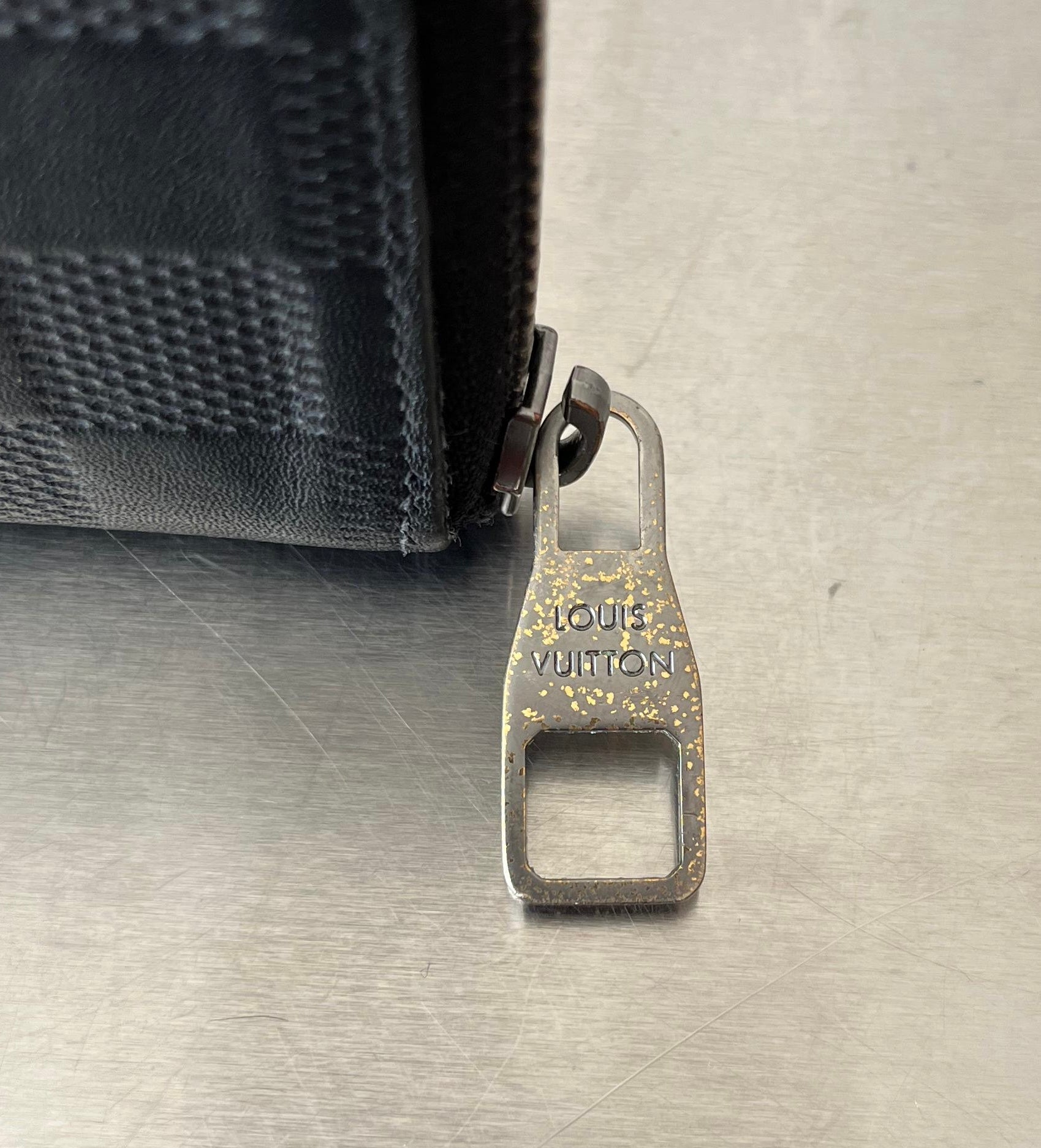 Louis Vuitton Zippy Vertical Infini Leder