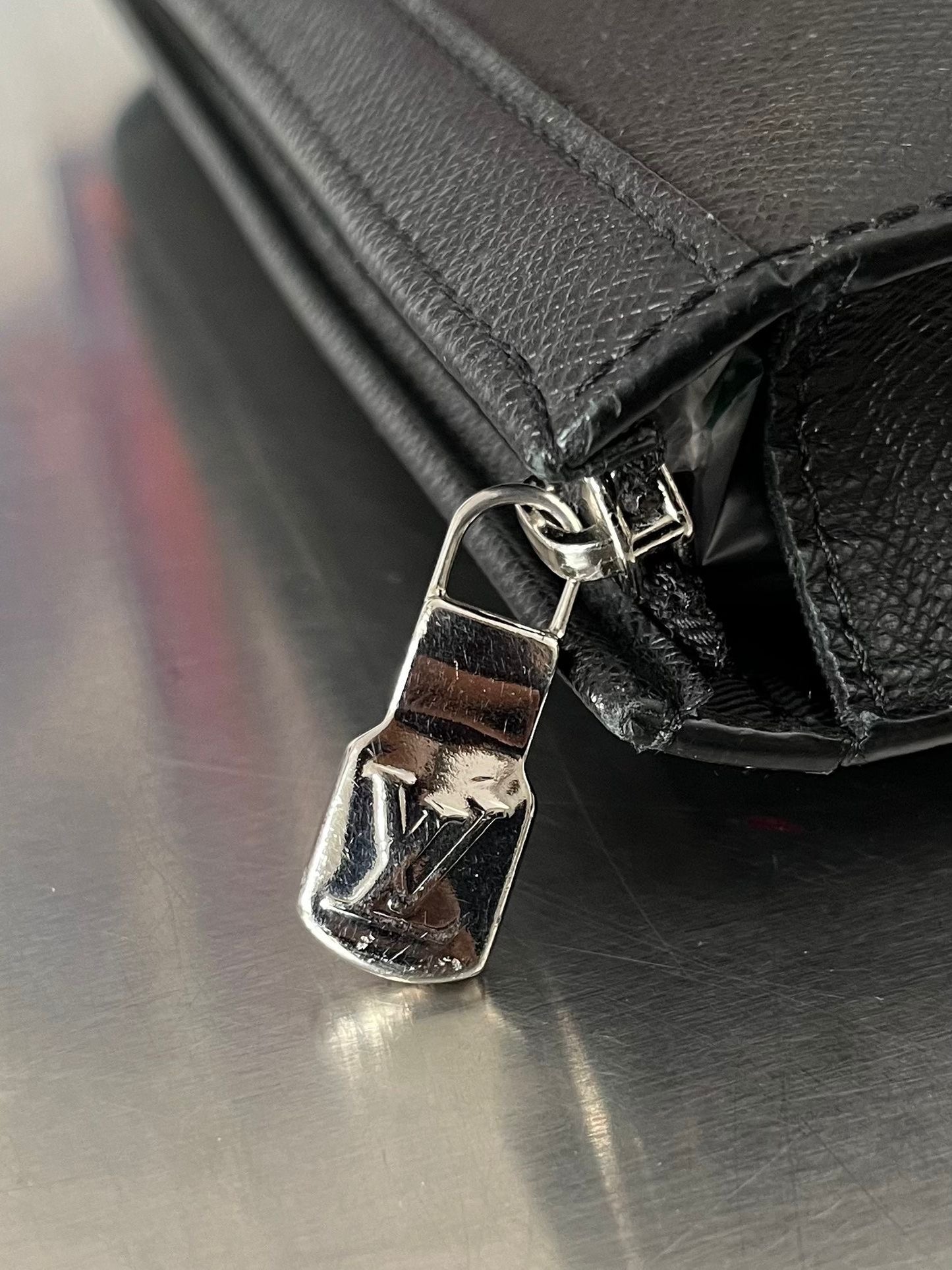 Louis Vuitton Pochette Voyage MM Taiga