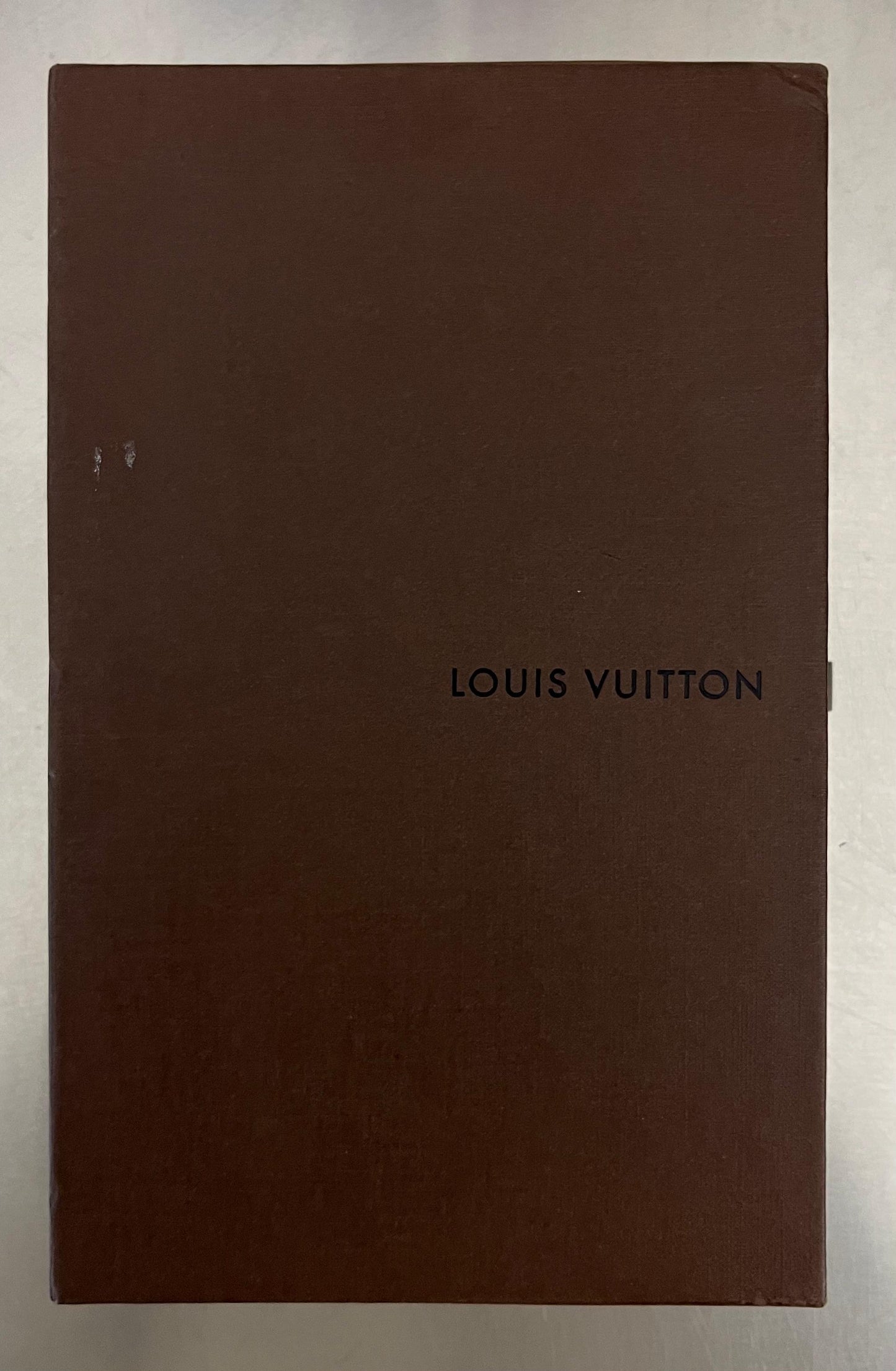 Louis Vuitton Zippy Lackleder