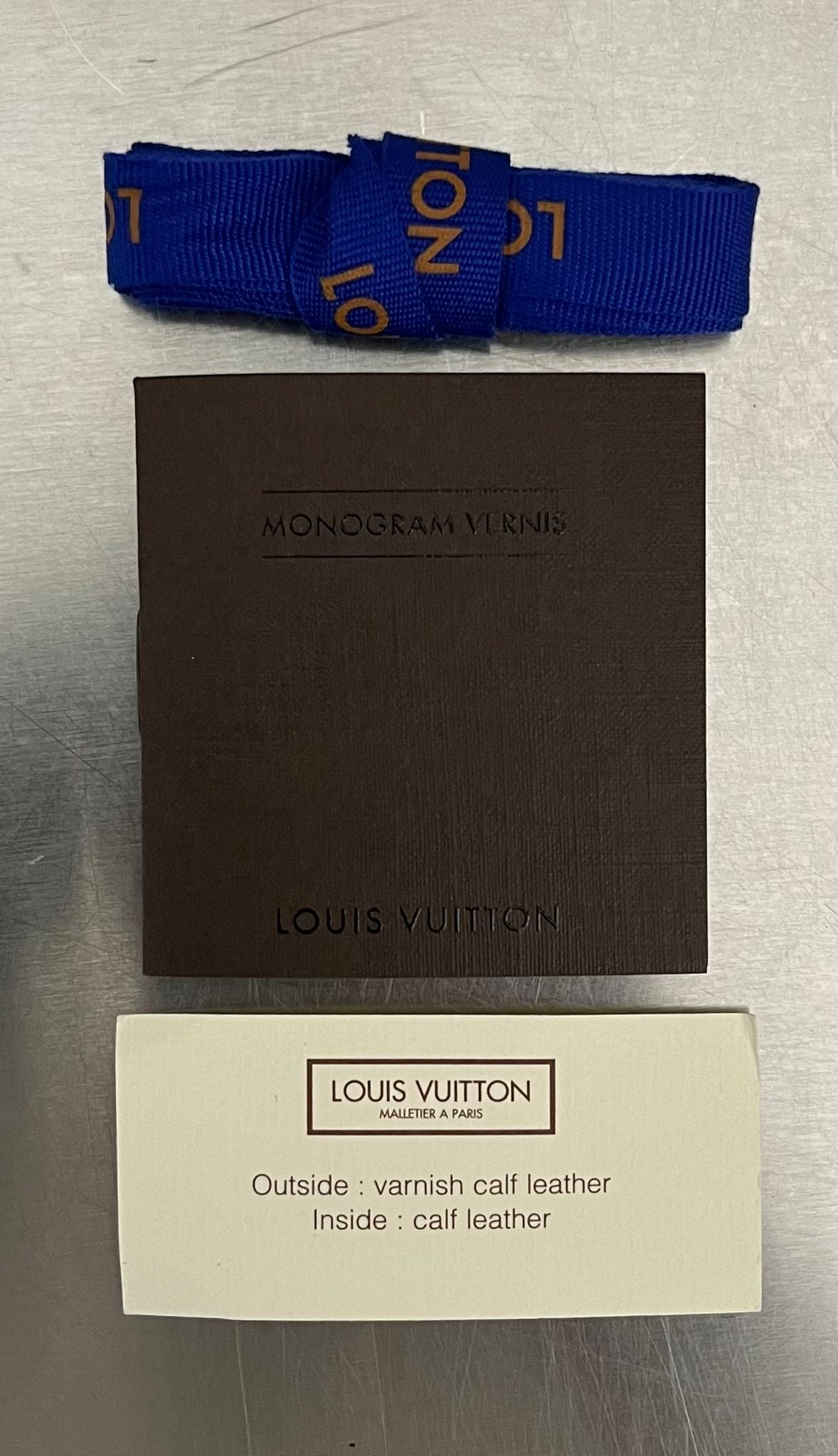 Louis Vuitton Zippy Lackleder