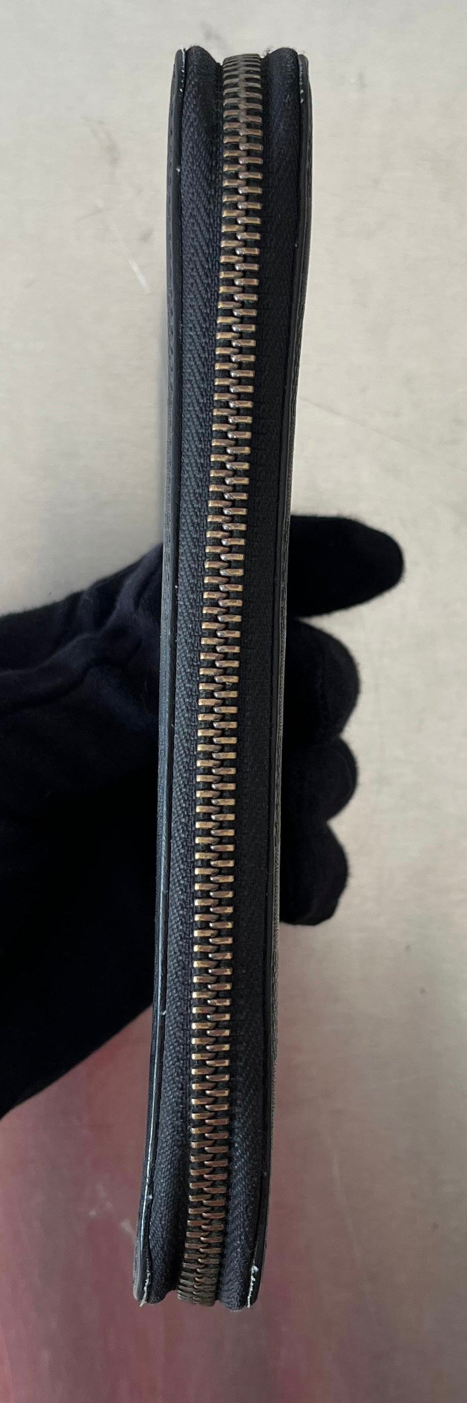 Louis Vuitton Zippy Vertical Infini Leder