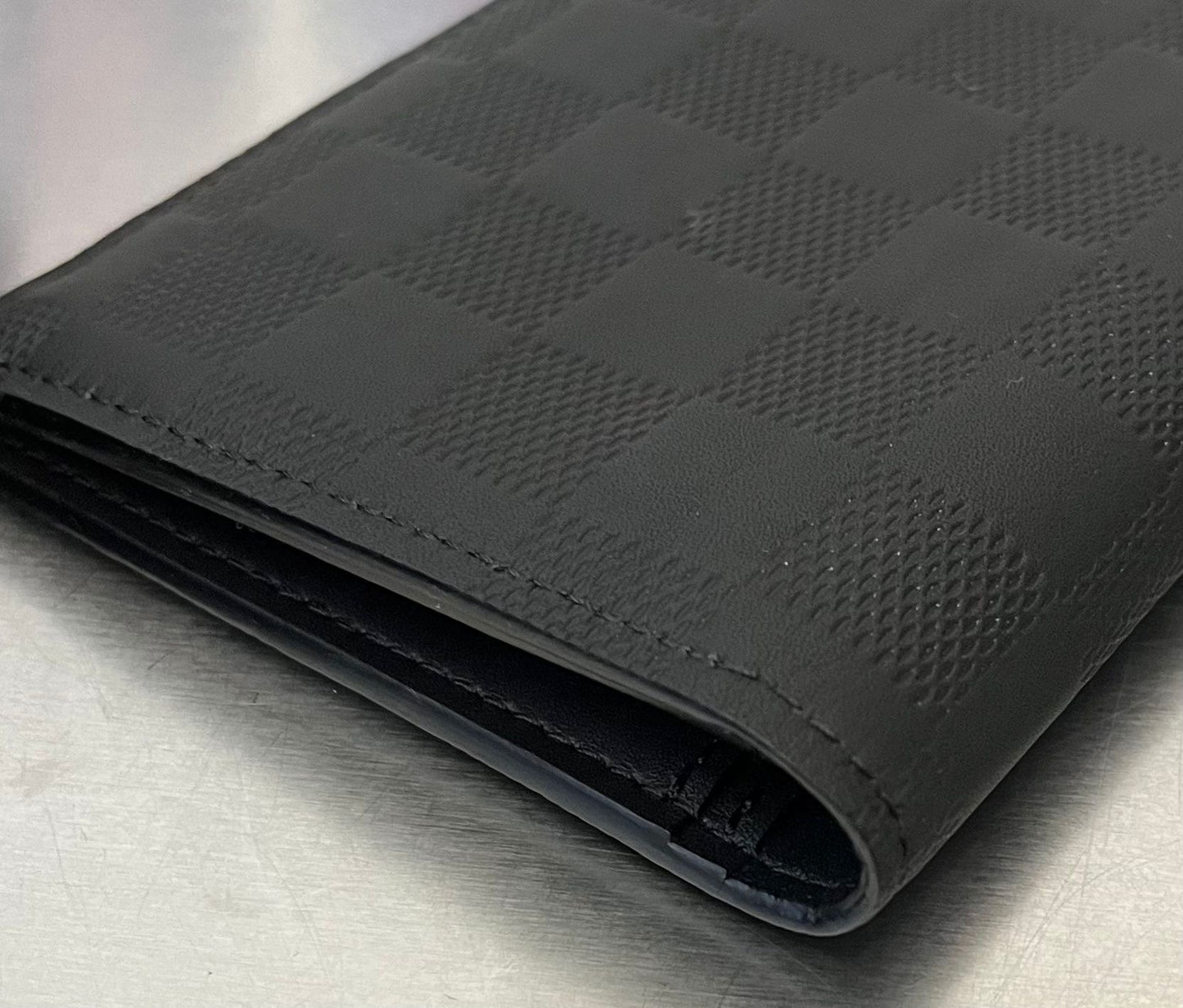 Louis Vuitton Brazza Infini Leder