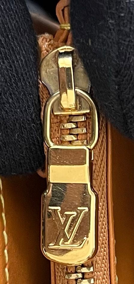 Louis Vuitton Zippy Nomade