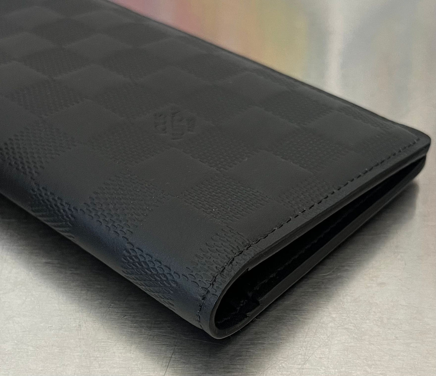 Louis Vuitton Brazza Infini Leder