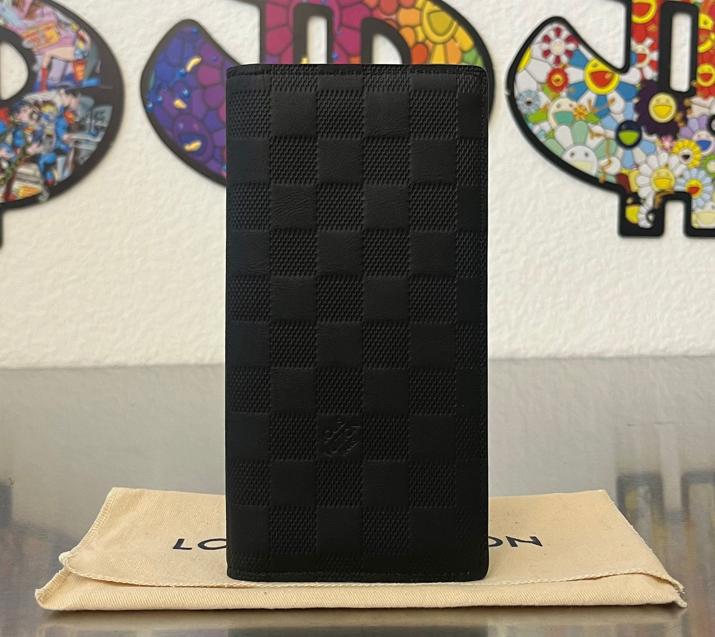 Louis Vuitton Brazza Infini Leder