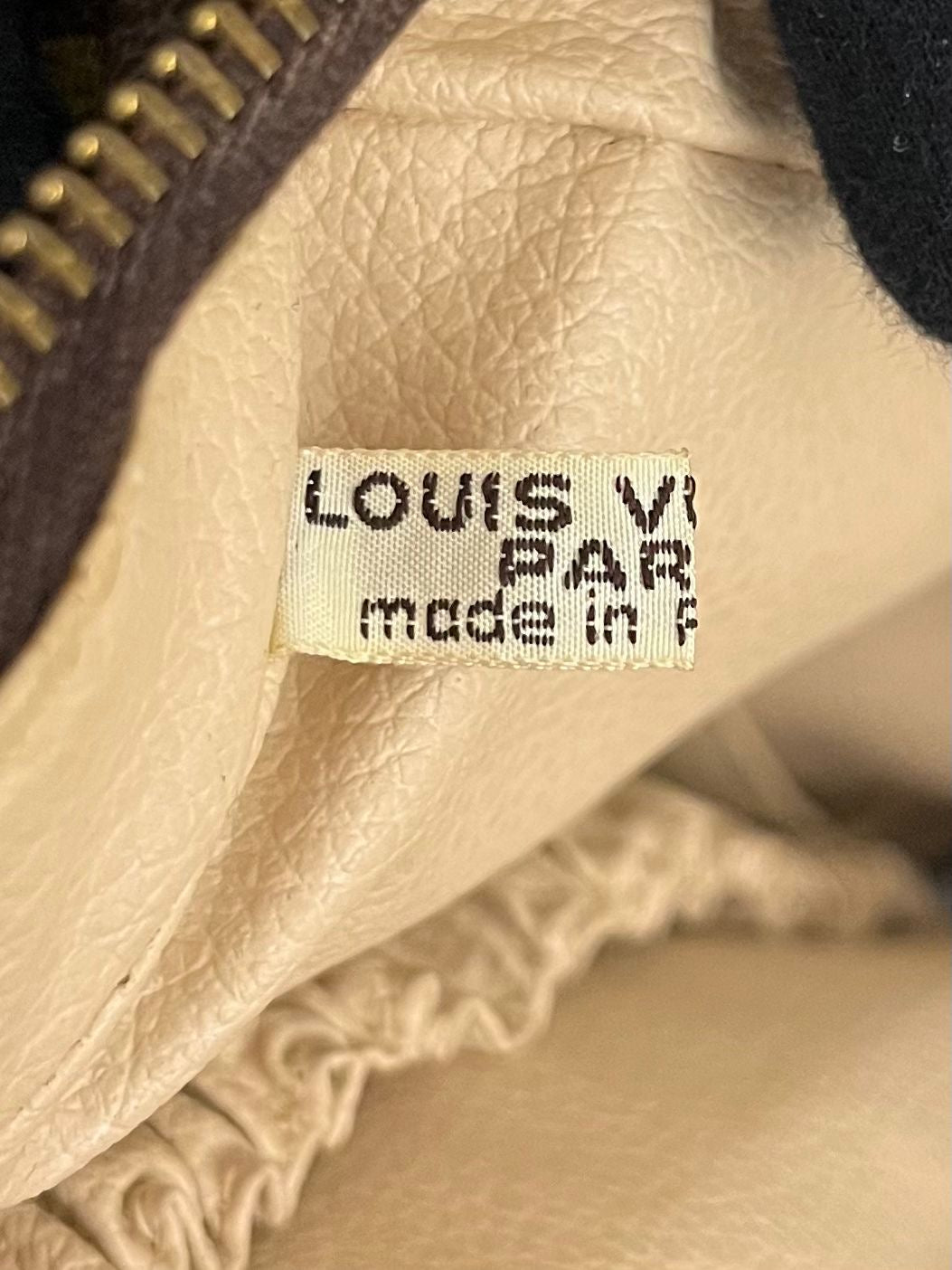 Louis Vuitton Trousse Toilette 28