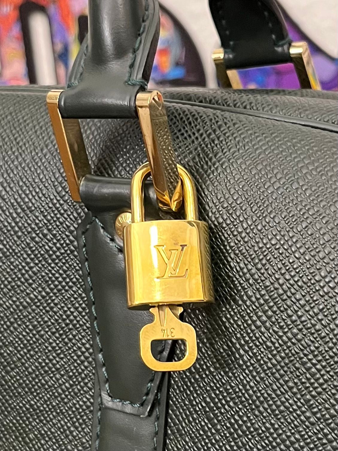 Louis Vuitton Helanga Taiga