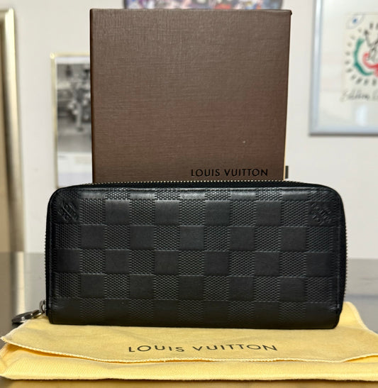 Louis Vuitton Zippy Vertical Infini Leder