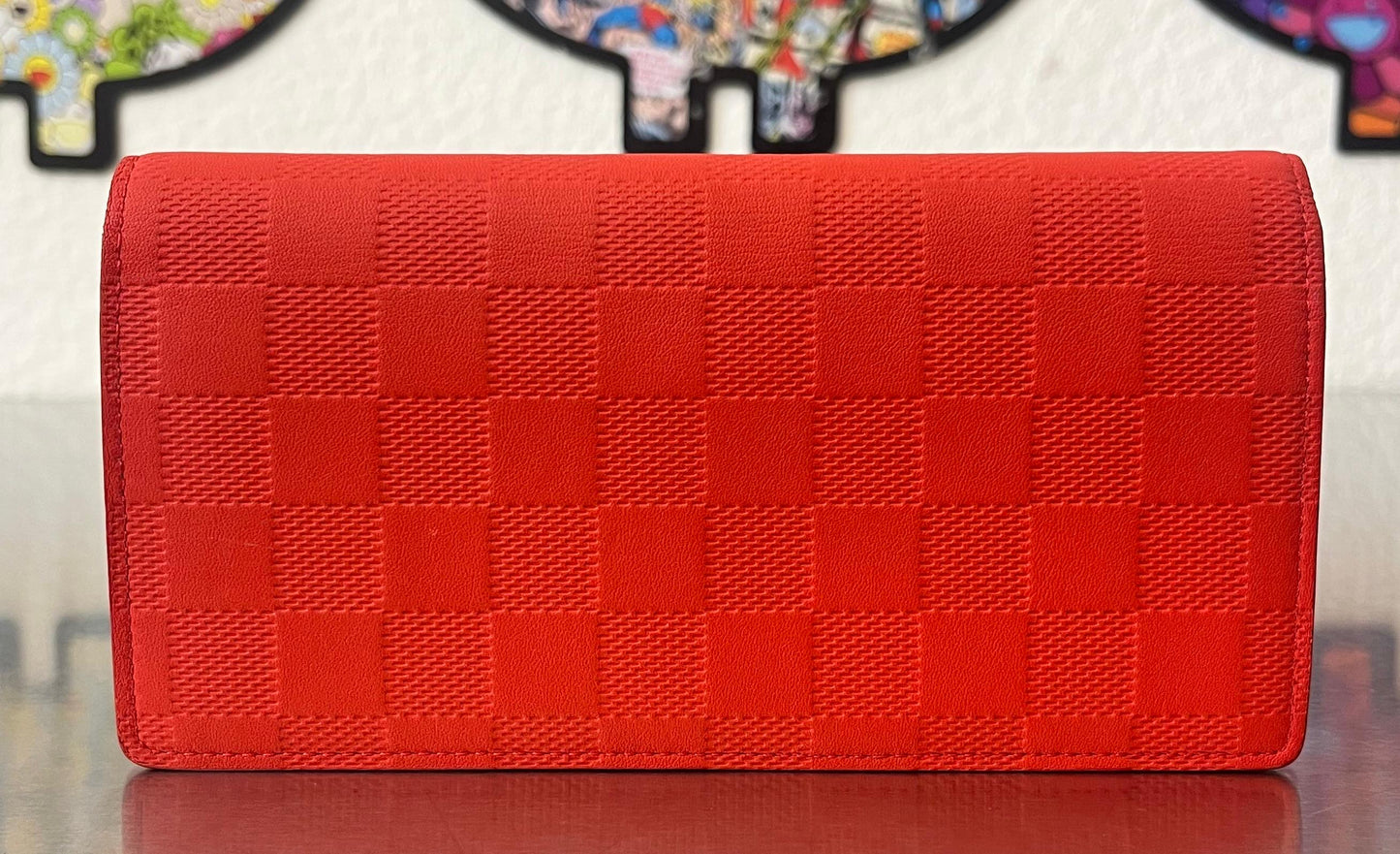 Louis Vuitton Brazza Infini Leder
