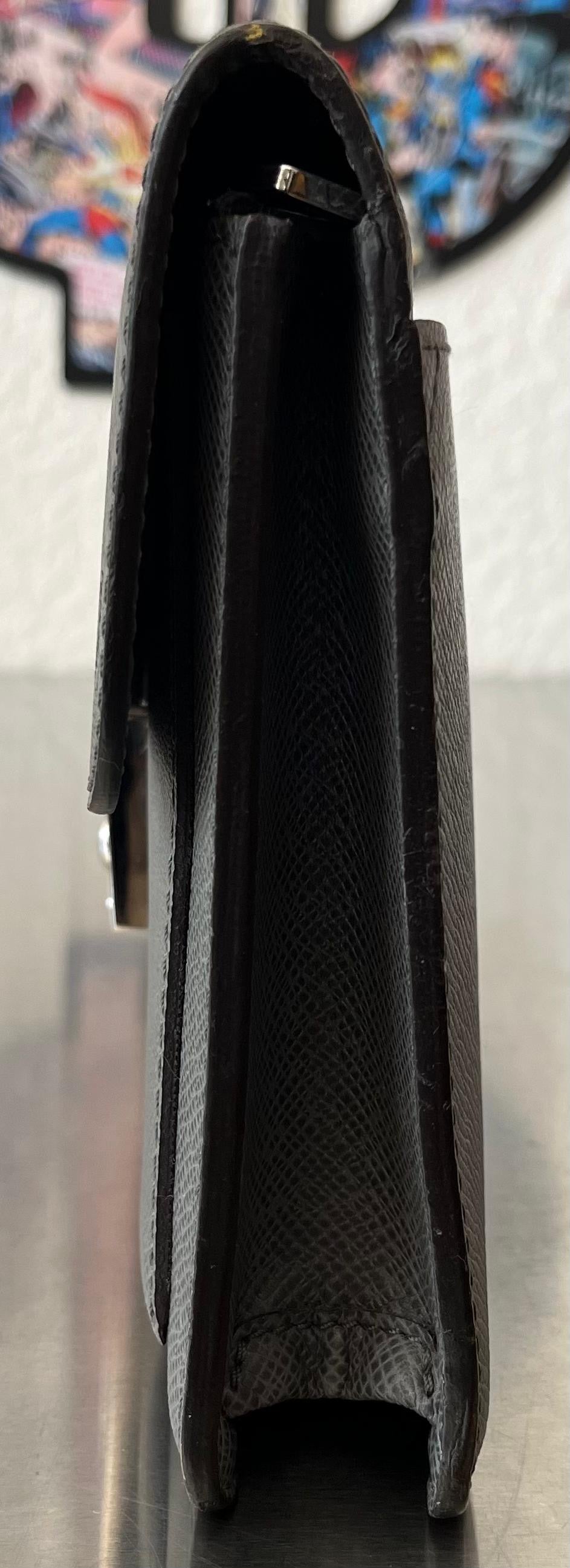 Louis Vuitton Neo Bellaia Taiga Leder