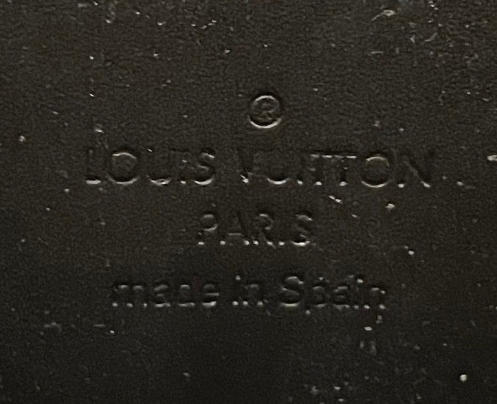 Louis Vuitton Zippy Lackleder