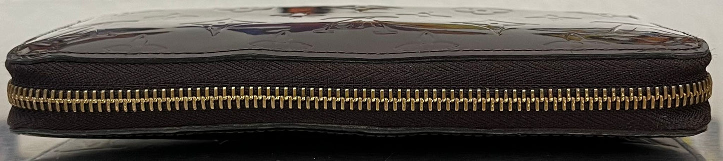 Louis Vuitton Zippy Lackleder