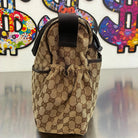 Gucci Umhängetasche / Wickeltasche