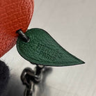 Hermès Orange Charm Anhänger
