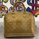 Louis Vuitton Alma PM Vernis Gold