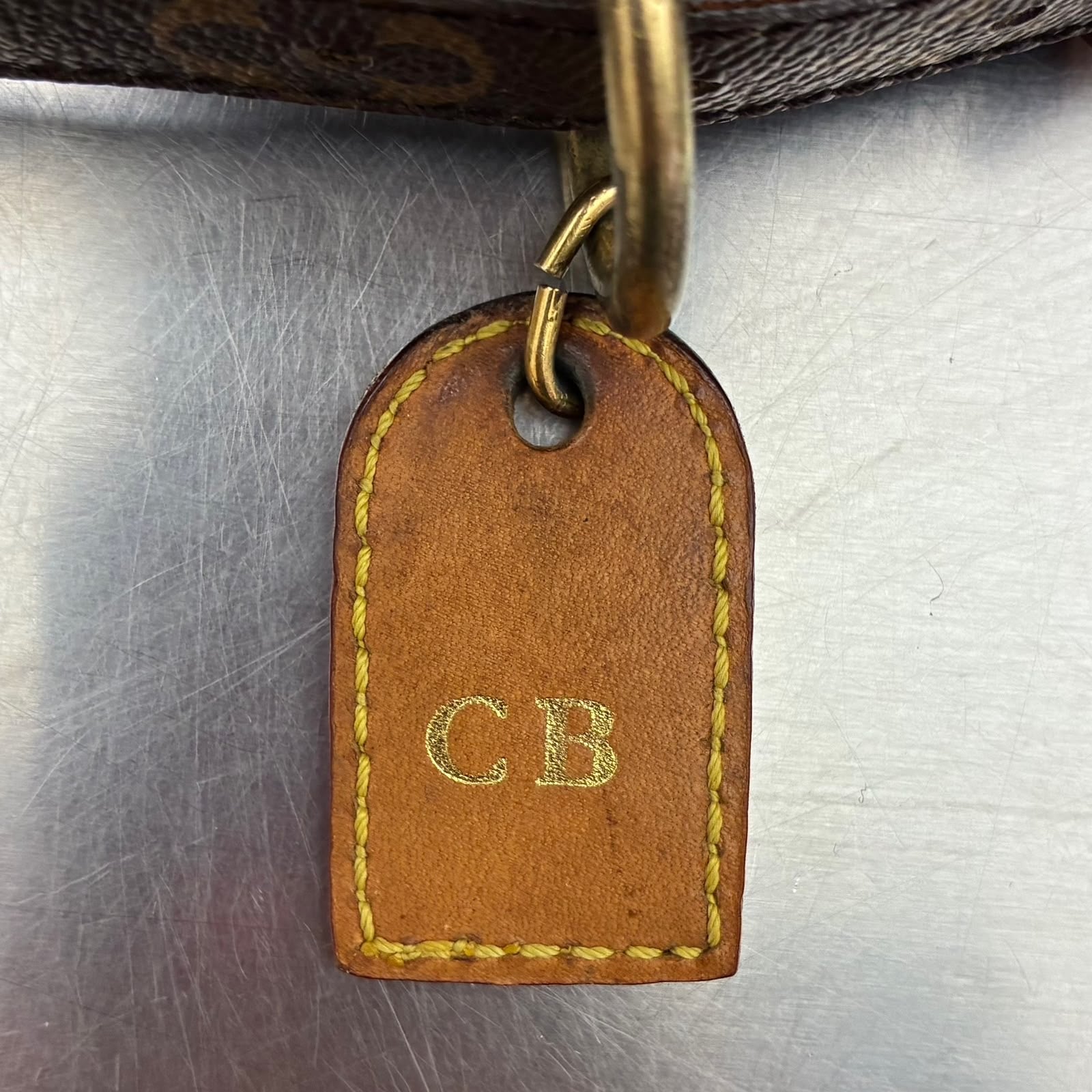Louis Vuitton Collier Baxter GM M58070