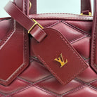 Louis Vuitton Dora Mini Malletage