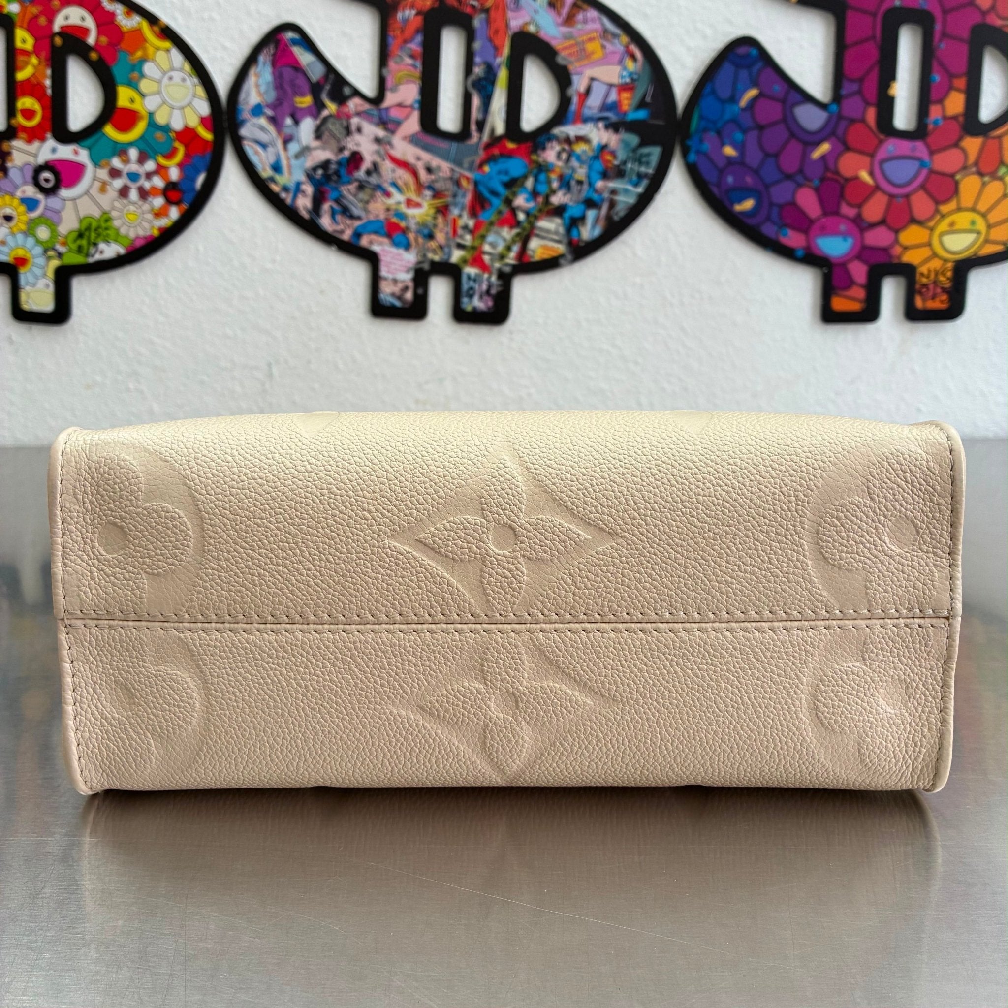 Louis Vuitton OnTheGo PM Empreinte M46569