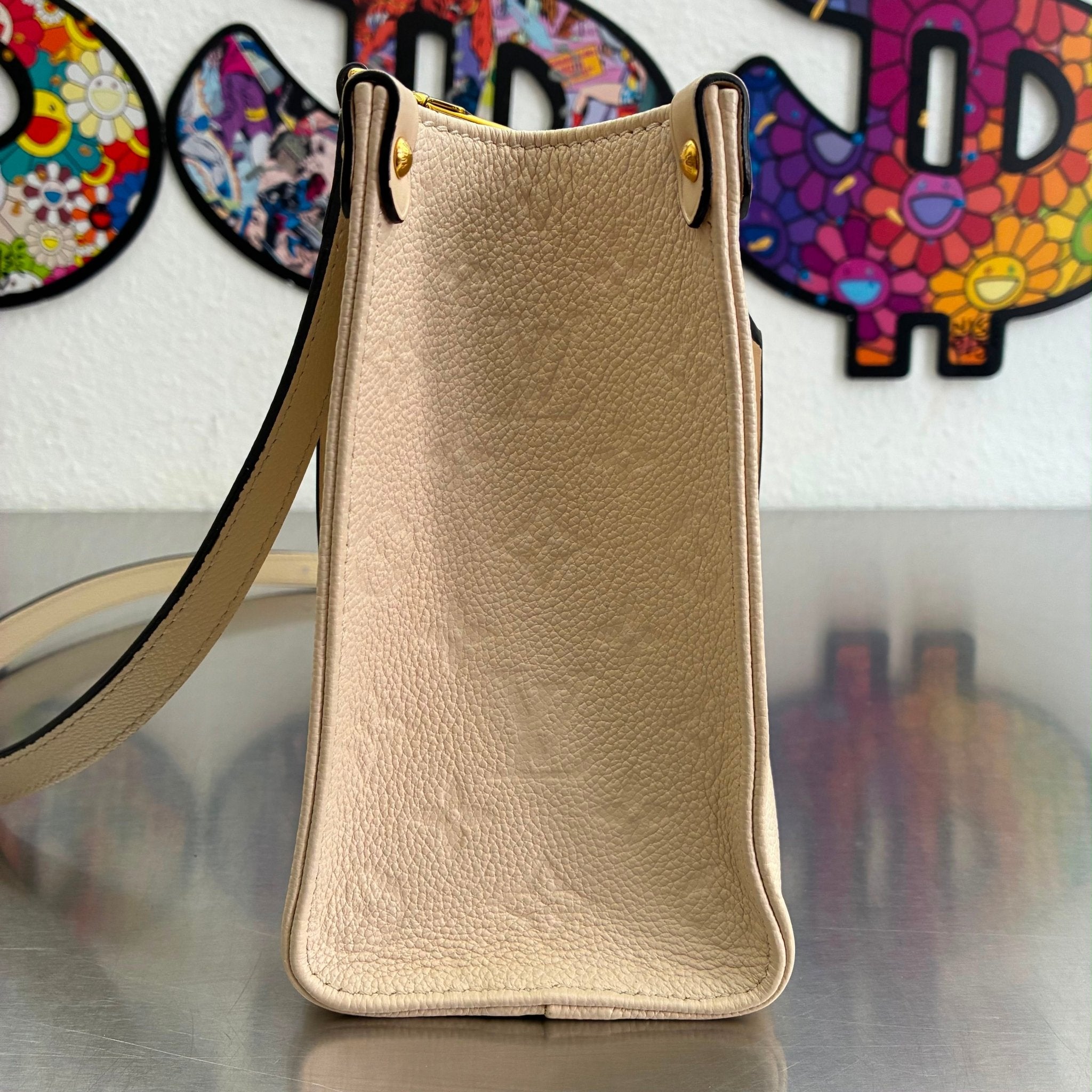 Louis Vuitton OnTheGo PM Empreinte M46569