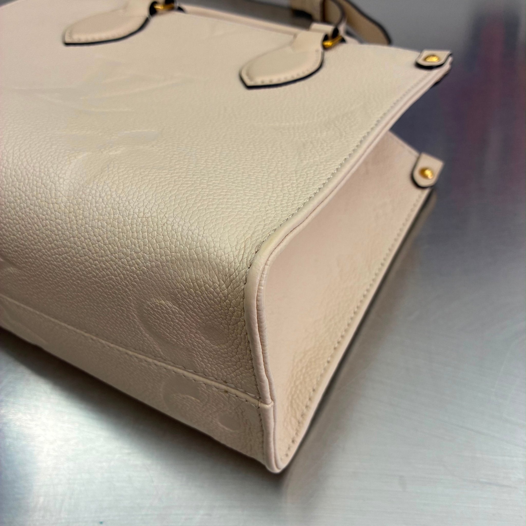 Louis Vuitton OnTheGo PM Empreinte M46569